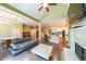 Expansive living room features hardwood floors, fireplace, dining area, open kitchen and high ceilings at 3915 Merriweather Woods, Johns Creek, GA 30022
