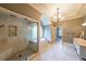 Luxurious main bathroom featuring a large walk-in shower, soaking tub, and marble tile at 3915 Merriweather Woods, Johns Creek, GA 30022