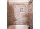 Tile shower with built-in shelves and updated showerhead at 3915 Merriweather Woods, Johns Creek, GA 30022