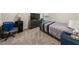 Bedroom includes a bed, dresser, desk and carpet at 4470 Madison Hall Dr, Cumming, GA 30028