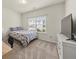 Comfortable bedroom with a bed, carpet and window, with desk for study at 4470 Madison Hall Dr, Cumming, GA 30028
