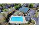 Aerial view showcasing the community pool, tennis courts, and basketball court at 580 Hammersmith Dr, Suwanee, GA 30024