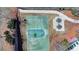 Community basketball court featuring well-maintained court with benches at 580 Hammersmith Dr, Suwanee, GA 30024