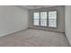 Bright bedroom with large windows offering natural light at 580 Hammersmith Dr, Suwanee, GA 30024