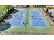 Community tennis courts with multiple courts and professional surfacing at 580 Hammersmith Dr, Suwanee, GA 30024