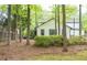 View of backyard featuring privacy landscaping, and mature trees at 909 Otter Ne Way, Marietta, GA 30068