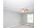 A bedroom featuring neutral walls and carpet and a ceiling fan at 909 Otter Ne Way, Marietta, GA 30068