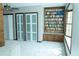 Open library area with large shelving, storage, and natural light at 909 Otter Ne Way, Marietta, GA 30068