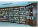 Spacious library with floor-to-ceiling custom wood shelving at 909 Otter Ne Way, Marietta, GA 30068