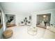 Inviting living room with neutral tones, plush seating, and access to the dining area at 909 Otter Ne Way, Marietta, GA 30068