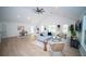 Bright living room featuring light wood floors, and high ceilings at 909 Otter Ne Way, Marietta, GA 30068