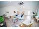 Spacious living room with vaulted ceilings, wood flooring, and neutral contemporary furniture at 909 Otter Ne Way, Marietta, GA 30068