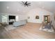 Bright living room featuring light wood floors, and high ceilings at 909 Otter Ne Way, Marietta, GA 30068
