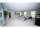 Large main bedroom with neutral paint, ample natural light, and a ceiling fan at 909 Otter Ne Way, Marietta, GA 30068