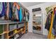 Walk-in closet with custom shelving, providing ample storage space for clothing and accessories at 2470 Woodmere Dr, Marietta, GA 30068