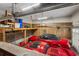 Spacious garage featuring a loft, two sports cars, and plenty of space for storage at 2470 Woodmere Dr, Marietta, GA 30068