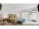 Cozy main bedroom featuring vaulted ceilings, and neutral tones, creating a peaceful retreat at 2470 Woodmere Dr, Marietta, GA 30068
