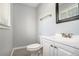 Cozy bathroom featuring a black and white mosaic tile floor and a modern vanity at 2804 Carolyn Se Dr, Smyrna, GA 30080