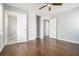 Bedroom boasting wood floors, closet, and adjacent bathroom and hallway access at 2804 Carolyn Se Dr, Smyrna, GA 30080