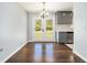 Dining room with hardwood floors and a view of the backyard through French doors at 2804 Carolyn Se Dr, Smyrna, GA 30080