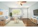 Cozy living room features hardwood floors, neutral paint, and plenty of natural light at 2804 Carolyn Se Dr, Smyrna, GA 30080