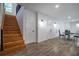 Finished basement area with tiled floors, neutral paint, and staircase to the upper level at 754 Fayetteville Se Rd, Atlanta, GA 30316