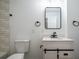 Contemporary bathroom featuring a sleek vanity, modern fixtures, and stylish design at 754 Fayetteville Se Rd, Atlanta, GA 30316
