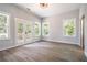 Bright bedroom boasts large windows, hardwood floors, and direct access to a private balcony at 754 Fayetteville Se Rd, Atlanta, GA 30316