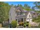 Charming two-story home with stone accents, covered porch, and a two-car garage at 818 Prada Ct, Lawrenceville, GA 30043