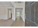 Bright foyer with hardwood floors and staircase leading to the second floor at 818 Prada Ct, Lawrenceville, GA 30043