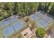 Aerial view of neighborhood tennis courts and playground at 818 Prada Ct, Lawrenceville, GA 30043
