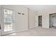 Carpeted bedroom with lots of natural light and a doorway leading to other rooms at 121 Dunleith Sw Pkwy, Marietta, GA 30008