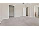 Bedroom featuring a spacious layout with doorways leading to closet and bathroom at 121 Dunleith Sw Pkwy, Marietta, GA 30008