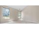 Bright bedroom with vaulted ceiling and large windows offering ample natural light at 121 Dunleith Sw Pkwy, Marietta, GA 30008