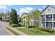 Residential street featuring well-maintained two-story homes with covered front porches at 121 Dunleith Sw Pkwy, Marietta, GA 30008