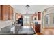 Spacious kitchen featuring dark granite countertops and ample cabinet space at 121 Dunleith Sw Pkwy, Marietta, GA 30008