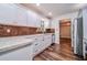 Modern kitchen featuring white cabinetry, granite countertops, and stainless steel appliances at 2915 Creek Park Dr, Marietta, GA 30062