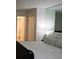 Bright bedroom with closet, and a mirrored wall at 63 Fair Haven Se Way, Smyrna, GA 30080