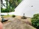 The backyard features stone landscaping, a fountain and a patio at 645 Crossbridge Aly, Johns Creek, GA 30022