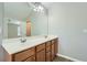 Bathroom featuring a double sink vanity and a large mirror at 3765 Clear Lake Nw Way, Acworth, GA 30101