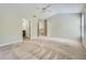 Spacious bedroom with neutral carpet, vaulted ceiling, and a ceiling fan at 3765 Clear Lake Nw Way, Acworth, GA 30101