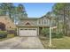 Charming two-story home with a two-car garage and professionally landscaped front yard at 3765 Clear Lake Nw Way, Acworth, GA 30101