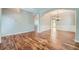 Open-concept living room showcasing hardwood floors, neutral paint and an airy feel at 3765 Clear Lake Nw Way, Acworth, GA 30101