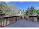 Inviting wooden deck with ample space, perfect for outdoor entertaining or relaxation at 2822 Savannah Walk Cv, Suwanee, GA 30024