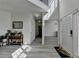 Spacious foyer with soaring ceilings, light wood flooring, and open floor plan at 2822 Savannah Walk Cv, Suwanee, GA 30024