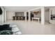 Spacious basement boasting a full bar with counter seating, a pool table, and modern lighting at 3011 Cravey Trl, Tucker, GA 30345