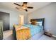 Inviting bedroom features plush carpet, a comfortable bed and an ensuite bathroom at 3011 Cravey Trl, Tucker, GA 30345