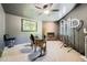 Bright living room boasts a fireplace, large picture window and unique decor at 3011 Cravey Trl, Tucker, GA 30345