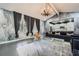 Open concept living area with a vaulted ceiling, large windows, and modern furnishings at 3011 Cravey Trl, Tucker, GA 30345