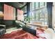 Chic living room with large windows, modern seating, and sophisticated decor elements at 3011 Cravey Trl, Tucker, GA 30345
